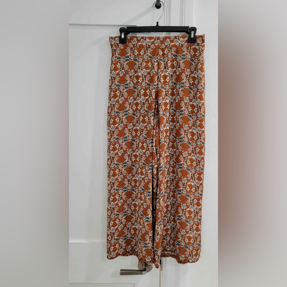 Max Studio burnt orange cropped palazzo pants w/ floral pattern (read)